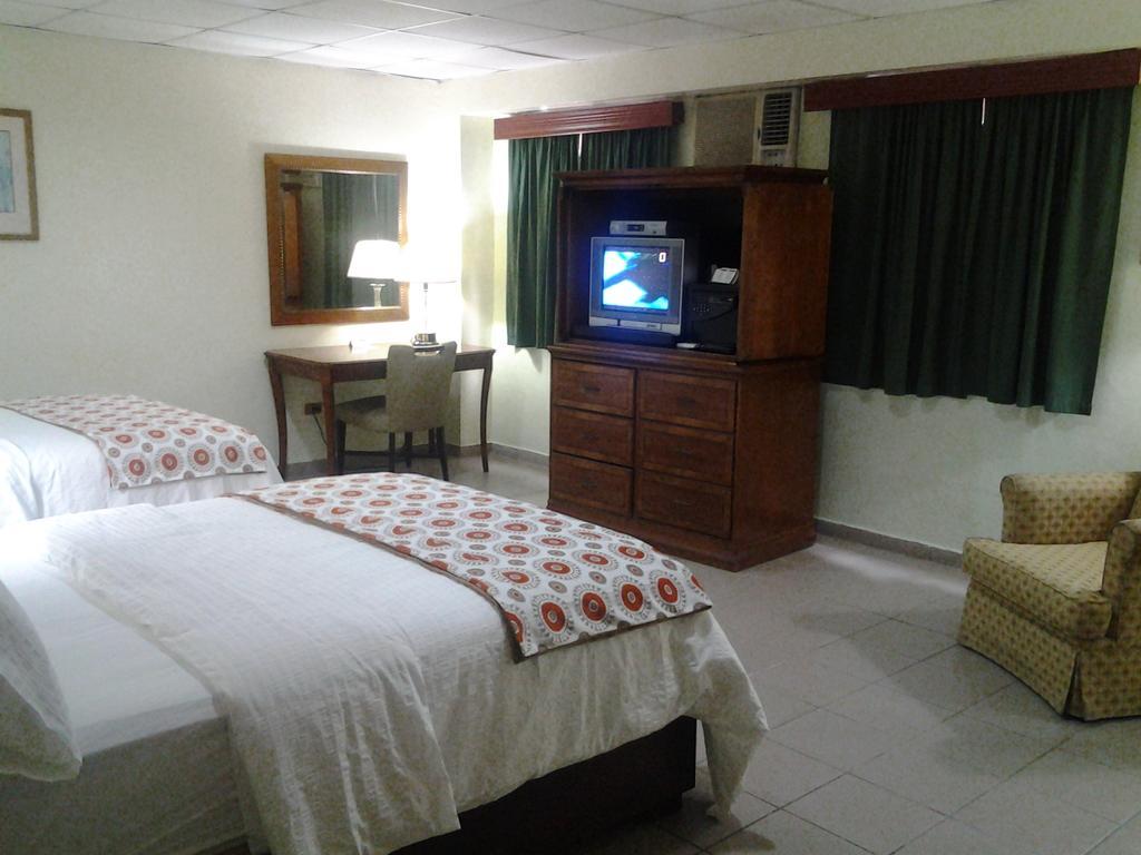 Micro Hotel Condo Suites Santo Domingo Szoba fotó